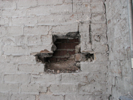exterior brick wall crumbling the exterior brick wall of the old cold storage room is crumbling it will need to be rebuilt before steel structure for new roof brought in bad brick exterior brick wall crumbling the exterior brick wall of the old cold storage room is crumbling it will need to be rebuilt before steel structure for new roof brought in bad brick